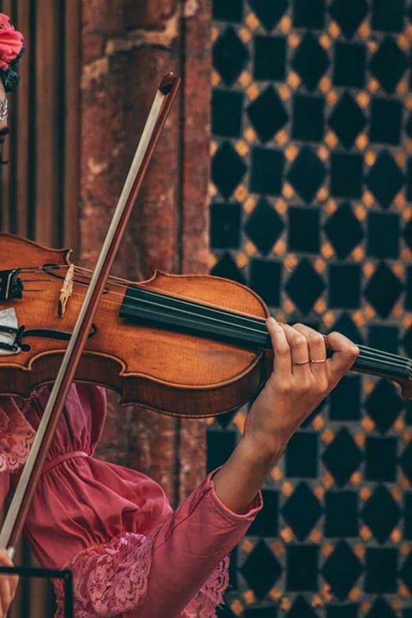 A-person-playing-a-cello-by-Roger-Ce-on-Unsplash